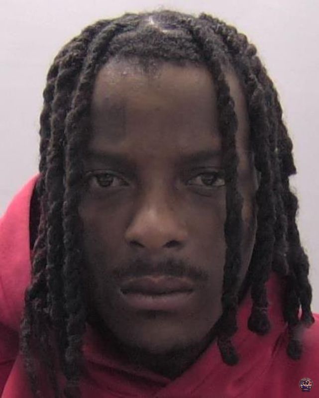 Booking photo of White De'vondre Shi'heim