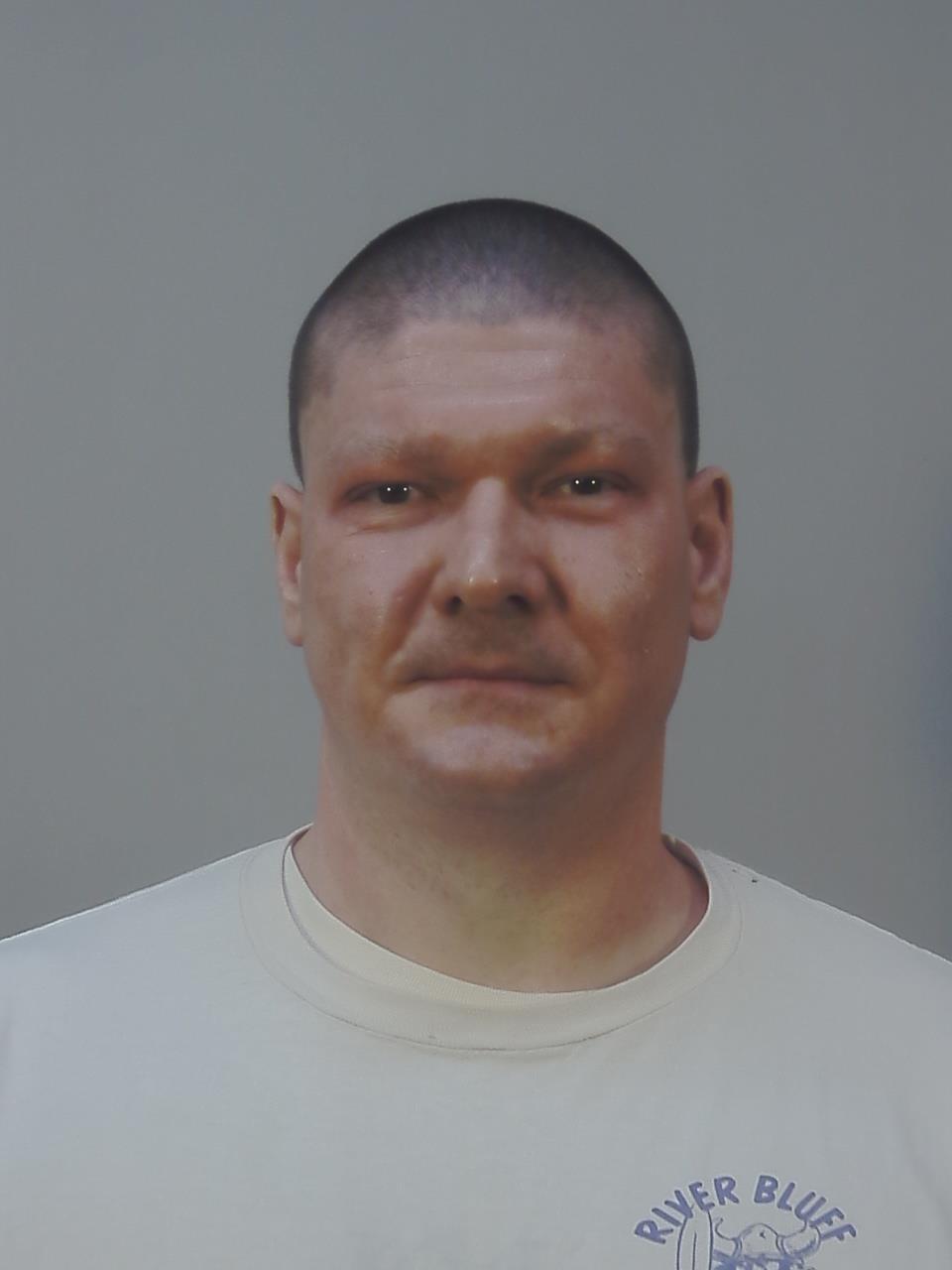 Booking photo of AARON CHANDLER BERNAU