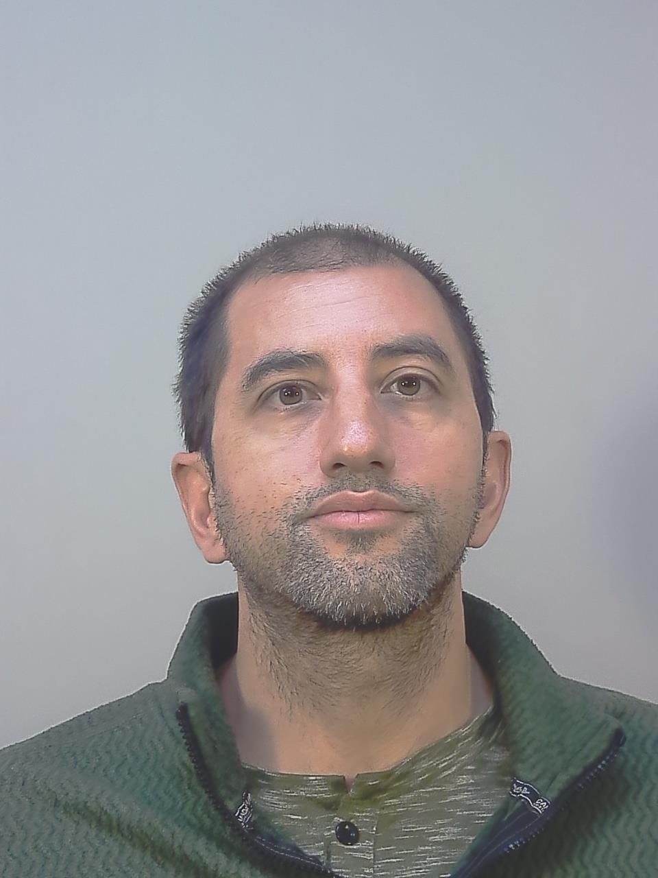 Booking photo of PAUL THOMAS MANRIQUEZ