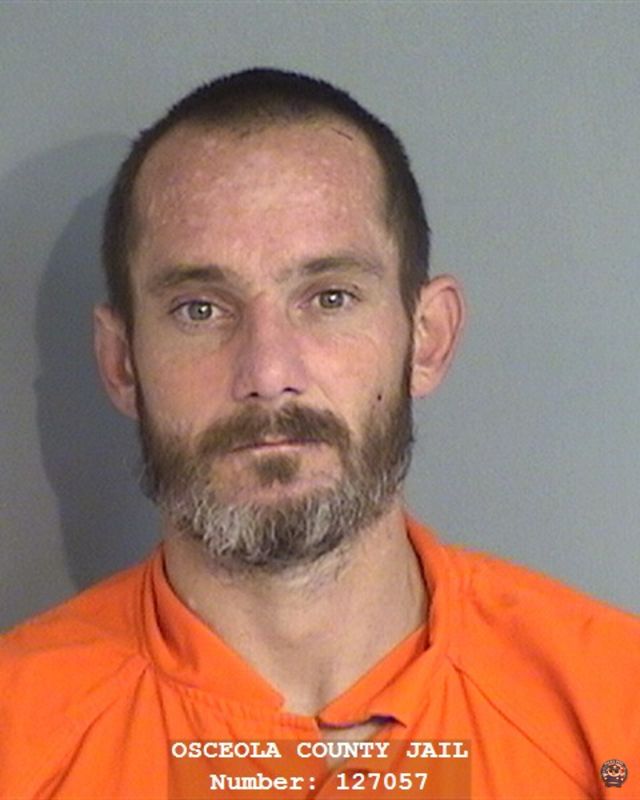 Booking photo of JOHNNY HOLCOMB