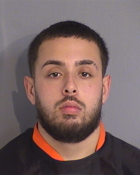 Booking photo of JULIO REYES