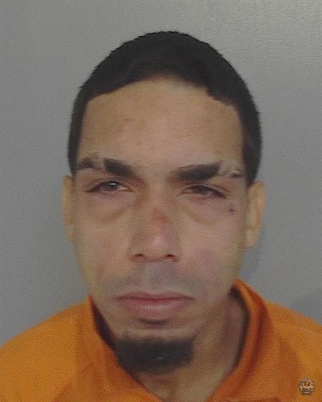 Booking photo of JUSTIN RAY RODRIGUEZ