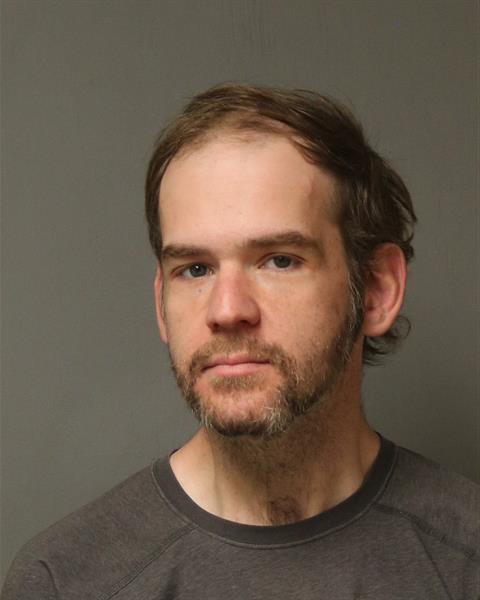 Booking photo of JUSTIN RAY REED